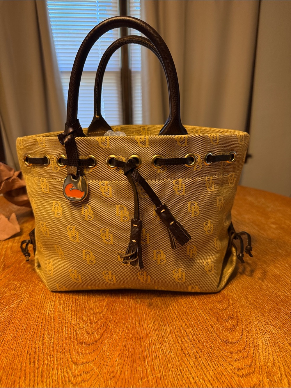 Dooney & Bourke Yellow Monogram Canvas Drawstring Tote with Brown Trim